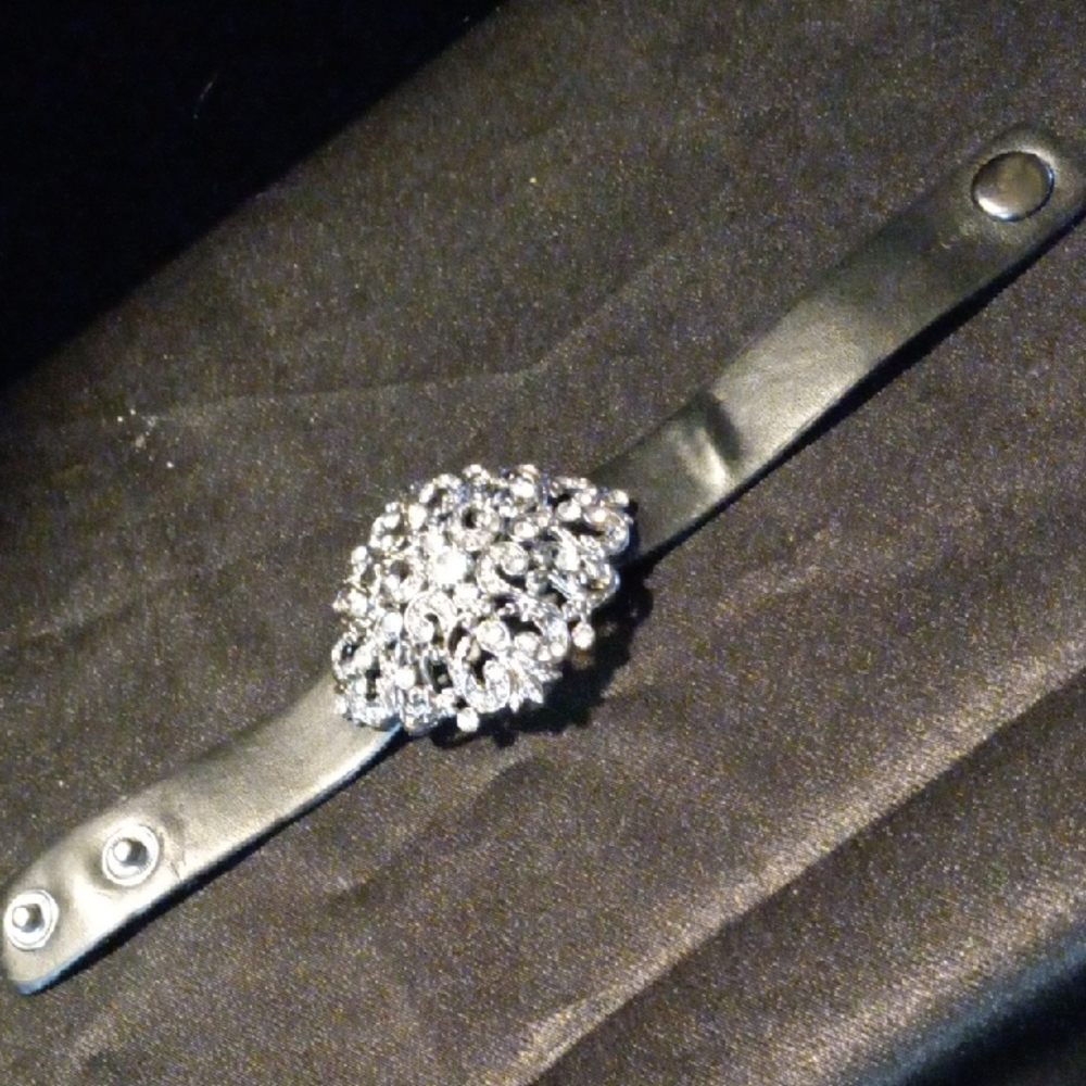 Elegant Black Leather Bracelet with filagree design and crystal encrusted brooch